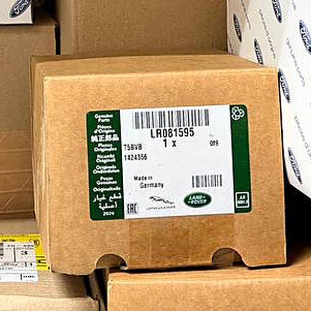 Этикетка Land Rover на коробке LR081595: Genuine Parts, Made in Germany, логотипы Jaguar и Land Rover